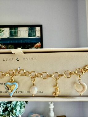 Luna Norte Gold Charm Bracelet with Freshwater Pearl and Genuine Shell